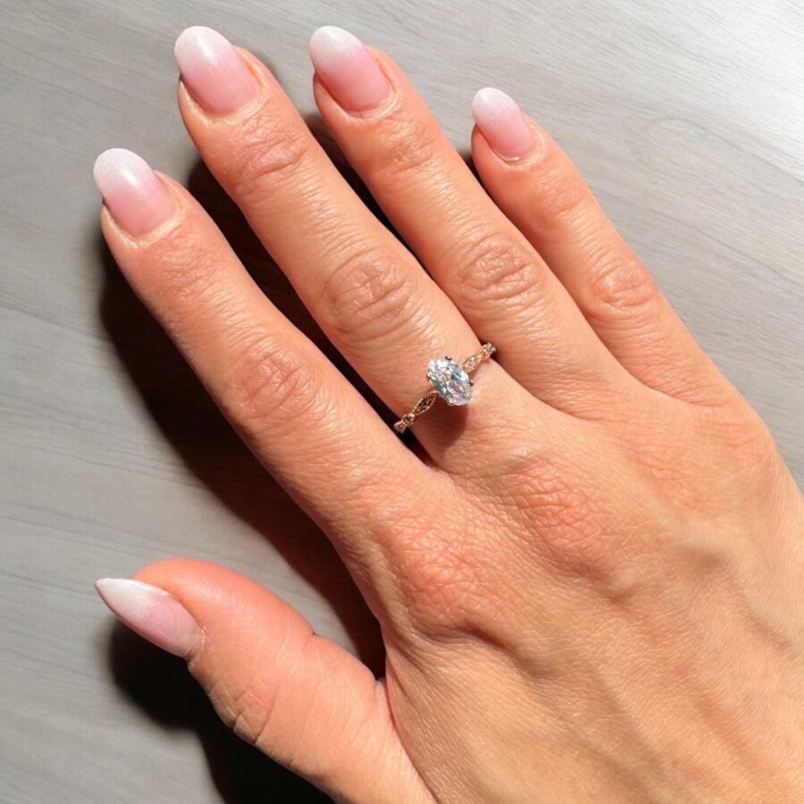 Oval ring set with natural diamonds,( E Color VVS2 Clarity) 0.93 center engagement ring, 14 carat. side diamond setting. - Image 3