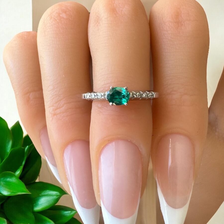 classic oval cut emerald .Emerald ring / 14 carat  ring with diamonds all around / Emerald ring in gold (D Color VVS1 Clarity)