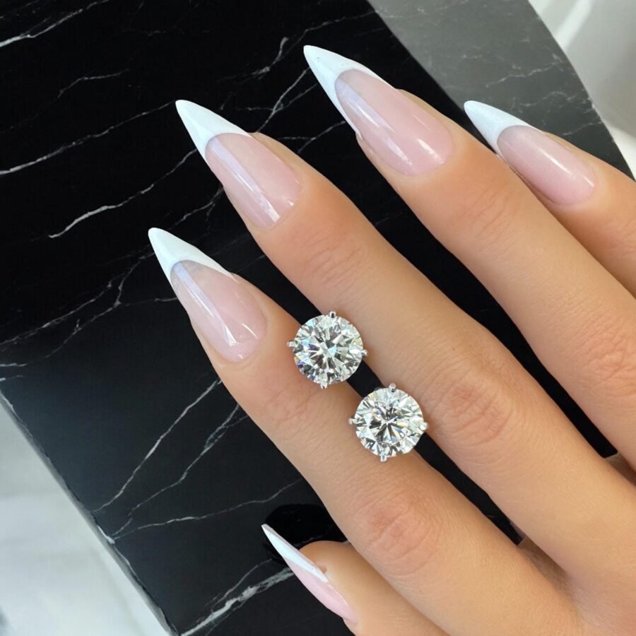 Diamond earrings. ( E Color VS1 Clarity IGI CERT) Martini model. lab grown diamonds.14K gold. Model 4 prongs. Yellow gold for her.8 carat.
